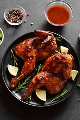 Grilled half chicken with lemon and rosemary