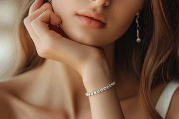 Foto op Plexiglas Diamond jewelry bracelet worn by young woman © The Big L