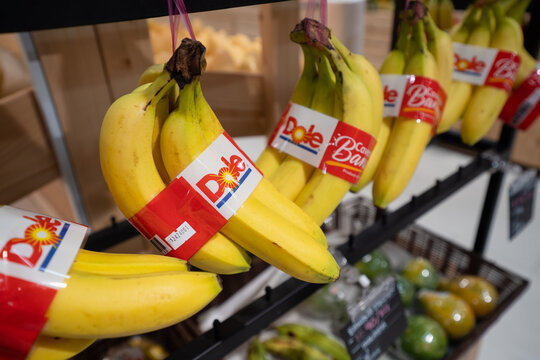 PENANG, MALAYSIA - JAN 12, 2023: Dole brand banana display in grocery store