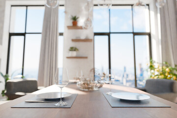 closeup of dining table in luxurious loft apartment with floor-to-ceiling windows and panoramic view; modern minimalistic interior design; bright daylight; 3D rendering