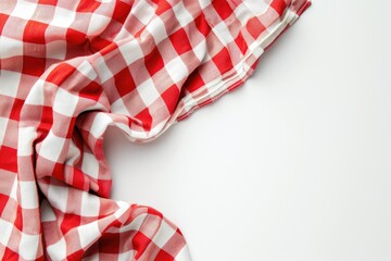 Red and white checkered napkin against a white backdrop