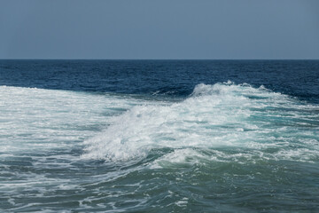 high waves with white foam at the red sea