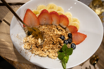 Oatmeal Porridge Bowl with Fresh Berries and Honey
