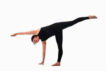 Ardha chandrasana, Ashtanga yoga  Side view of woman wearing sportswear doing Yoga exercise against white background.