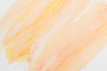 Abstract liquid art background. Brown watercolor translucent blots on white paper