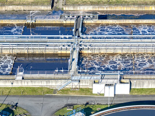 Vertical view of the municipal wastewater treatment plant. Servicing equipment, circular sedimentation tanks, water clarification, aeration of activation tanks , separation sumps and other technology.