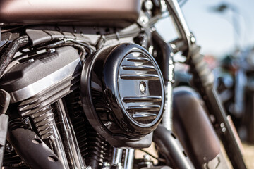 Close-up of the engine of a custom motorcycle. Selective focus.