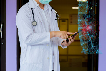 Doctor shows a patient's spinal anatomy, checks the test result on the virtual interface and analyzes the data. Skeleton disease, medicine of the future.