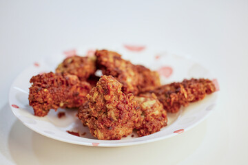 pork croutons in a corn crust on a plate