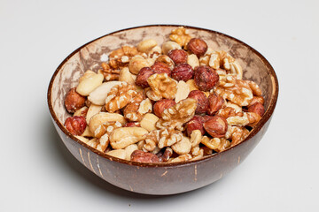 mixed hazelnuts, cashew nuts and almonds in a bowl.