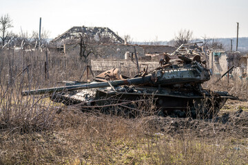 A destroyed tank in Ukraine, war in Ukraine - obrazy, fototapety, plakaty