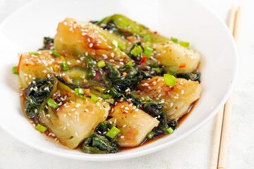 Homemade asian sauteed soy bok choy with sesame seeds. Stir fry pak choi. Asian food