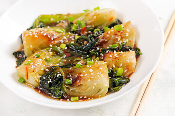 Homemade asian sauteed soy bok choy with sesame seeds. Stir fry pak choi. Asian food