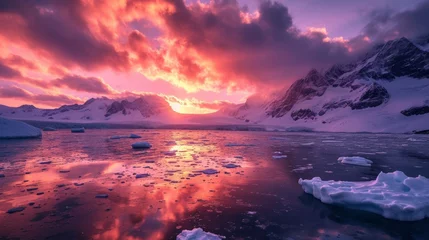 Photo sur Plexiglas Violet Sunset with mountains in the background and a lake with glacier water in the foreground