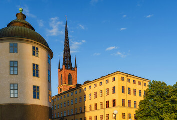 The Riddarholmen Church in Stockholm, Sweden. Cityscape of Stockholm, Sweden. Evening time and soft sunlight. A walk through the city.