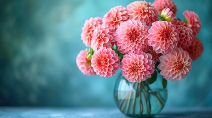  a vase filled with lots of pink flowers on top of a wooden table next to a blue wall and a blue wall behind the vase with a bunch of pink flowers in it.