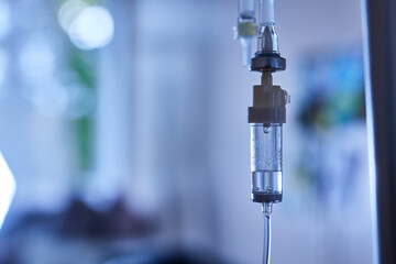 IV on the background of a hospital room, selective focus