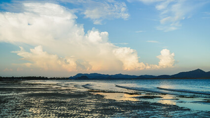 The sea with twilight sky in morning at koh mook, Trang province, Thailand. Tropical sunset or sunrise Landscape light by the sea.