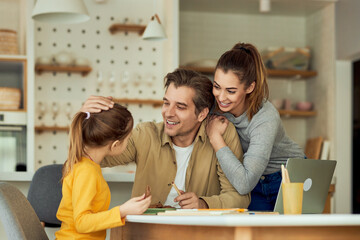 A sweet family enjoying a good time at home.