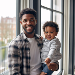 Engaged in child care, a portrait captures the joy of an African American father, portraying love, happiness, and a strong parent-child connection.