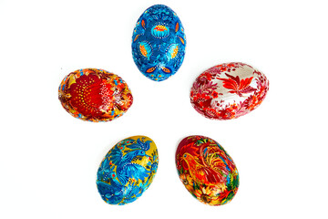 Ukrainian Easter eggs with Petrykivka painting. Isolated on a white background. Hand painted wooden decor. Small gift for mom.