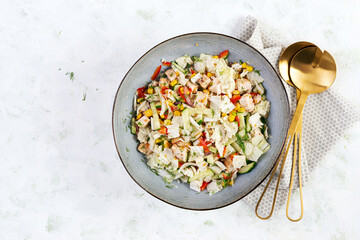 Chinese cabbage salad with chicken meat, corn, cucumber and dressing mustard. Asian food. Top view