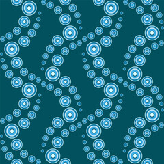 Seamless pattern in geometric style with many circles. Calm light blue and turquoise colours on dark background. Many rings. Bubble path design. For printing wallpaper, giftpapers, textile.