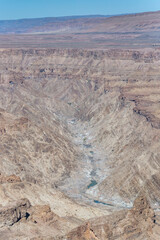 little water in river bed and steep slopes from Canyon viewpoint, Fish River Canyon,  Namibia