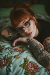 Fototapeta premium tattooed beauty girl with glasses and red hair