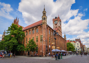Gothic building of a medieval City Hall in Torun, Poland. Magnificent clock tower. The mediaeval...