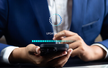 Technology update software concept, Man working on software update enhance device with the Latest Version and Improved Security, Upgrade Device with Operating System Enhancements, Updating screen.