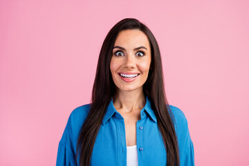 Photo of ecstatic nice girl with straight hairdo dressed blue shirt staring at unbelievable...