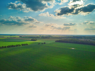 Fototapeta na wymiar Aerial drone view of green fields and meadows in Yveliness,, near Paris, France
