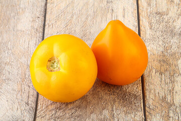 Ripe yellow bright juicy tomato