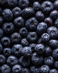 from above, background with fresh, wet blueberries - 724835604