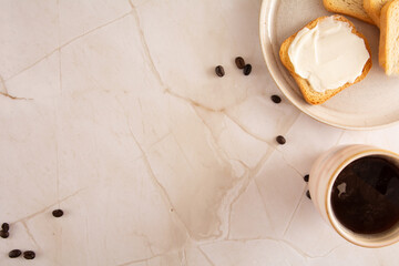 Toast with cream cheese in a marbled background in aerial view mockup