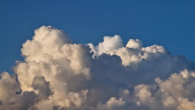 Observe the impressive Cumulonimbus clouds, characterized by their towering stature reminiscent of nature's skyscrapers.