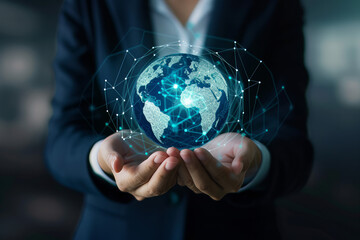 Business woman holding a globe hologram in her hands. Global business concept, international world trade network.
