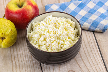 Organic cottage cheese in the bowl