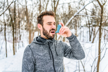 Fitness running man in winter season with asthma