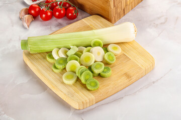 Ripe sliced leek over board