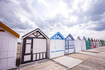 Fototapeta na wymiar Colorful beach huts in Cayeux, Normandy, France