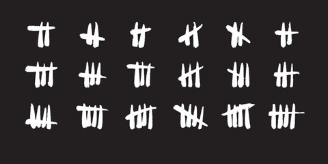 Set of tally marks. Vector hand drawn icons. White colored slash strokes on black board