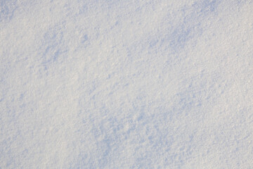 Texture surface of snow. Background with selective focus and copy space
