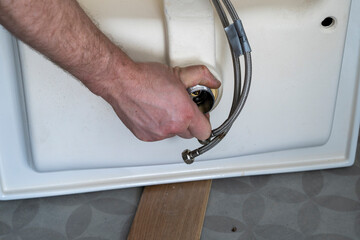 Masterfully Installing a Bathroom Sink Drain for Optimal Drainage Performance.