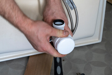 Masterfully Installing a Bathroom Sink Drain for Optimal Drainage Performance.