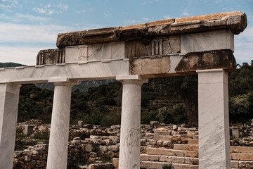 arch entrance, stone stairs, ancient ruins of historical heritage city of Kaunos