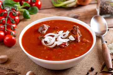 Goulash soup with beef and sweet pepper. Stew of meat and vegetables, flavored with paprika. Hungarian cuisine.