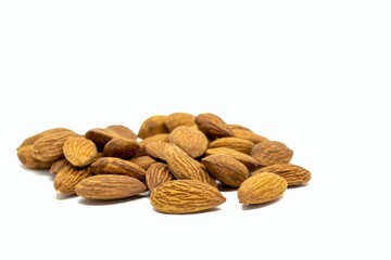 Closeup of Almond Heap Isolate on White Background with Copy Space, Healthy Eating and Lifestyle Concept