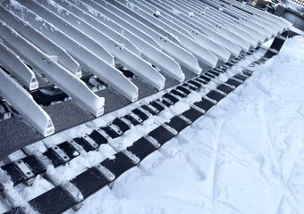 Snowcat machine for snow removal. Preparation ski trails. Snow groomer. Snowy tracks of snowcat in...